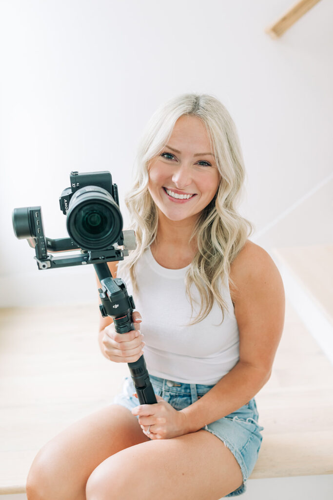 woman holding video camera