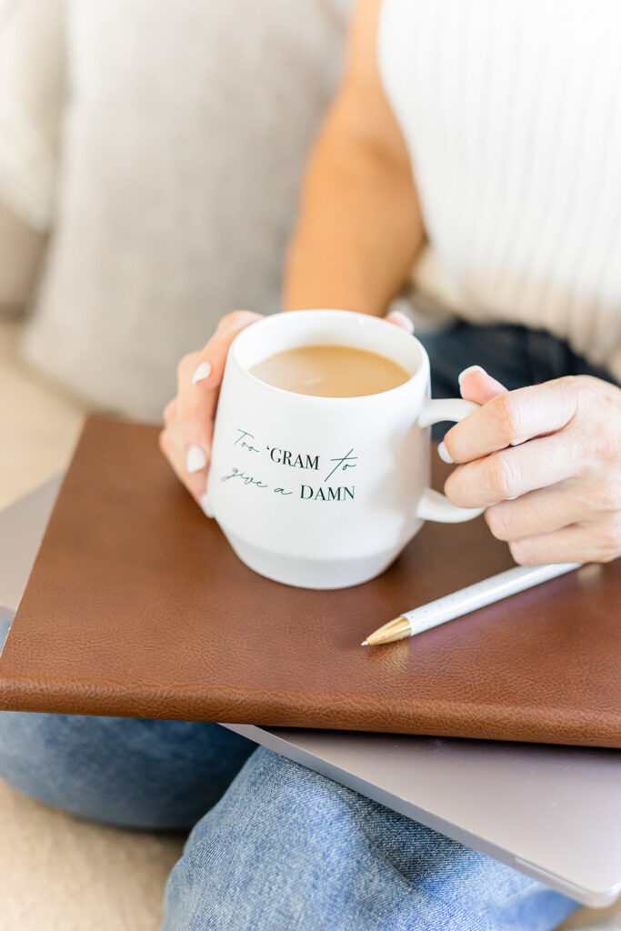 end-of-week tasks require laptop, journal, pen and coffee mug