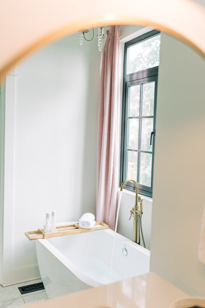 dreamy bath tub with water running